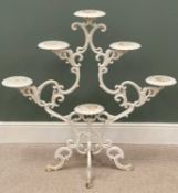 ANTIQUE CAST IRON MULTI PLATFORM PLANT STAND, scrolled detail, on quad support