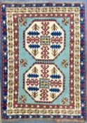 TURKISH KAZAK WOOL RUG, blue ground with geometric pattern, 196 x 138cms