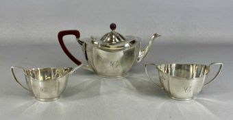GEORGE V SILVER THREE-PIECE TEA SERVICE, oval panelled form, monogrammed 'C', teapot with polished