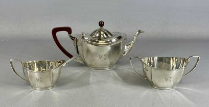 GEORGE V SILVER THREE-PIECE TEA SERVICE, oval panelled form, monogrammed 'C', teapot with polished