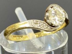 18CT GOLD & PLATINUM SOLITAIRE DIAMOND CROSSOVER RING, diamond approx. 0.25ct, size J, 2.4g