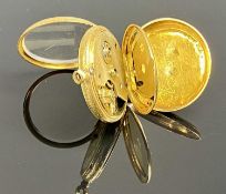 18K GOLD LADIES FOB WATCH, gilt dial with foliate engraved centre, enamelled Roman hours, blued