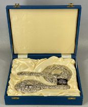 PLUS LOT 46 - CONTEMPORARY SILVER BACKED HAIRBRUSH & HAND MIRROR, with ornate embossed decoration,