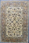 KASHAN WOOL CARPET, cream centre ground, 300 x 200cms
