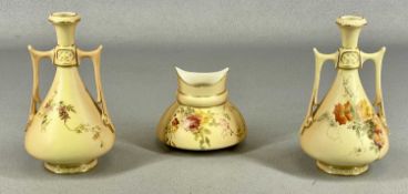 ROYAL WORCESTER BLUSH IVORY VASES, a pair of slender two-handled vases, pattern 1021, puce marks
