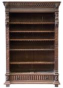 GOTHIC REVIVAL OAK BOOKCASE, a fine example, carving throughout, six shelves over a base drawer, 216