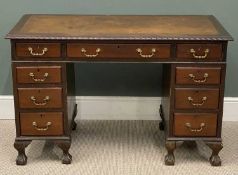 TWIN PEDESTAL DESK, reproduction mahogany with tooled top and brass drop handles, on ball and claw