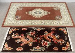 FRITH RUGS 'Rajbik' design, ground rust with central diamond shape motif, 244 x 152cms and a