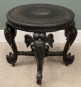 INDIAN HARDWOOD CARVED OCCASIONAL TABLE circa 1900, four elephant head supports, 59 x 61cms (