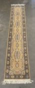 SUPER KESHAN RUNNER, multi-patterned with tassel ends and wide border, 375 x 70cms Provenance: