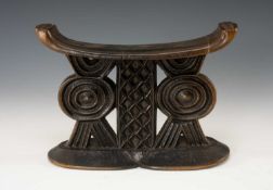 FINE SHONA HEADREST, Zimbabwe, narrow long curved platform supported on triple carved column and