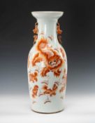 CHINESE IRON RED 'BUDDHISTIC LION' VASE, 20th C., painted with lions and poetic inscription verso,