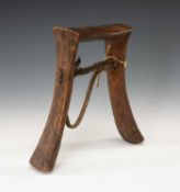 TURKANA HEADREST, Kenya, small platform raised on flaring bowed supports with incised geometric