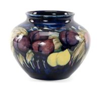 WILLIAM MOORCROFT POTTERY VASE, 'Wisteria' pattern, painted signature, 12cms (h)