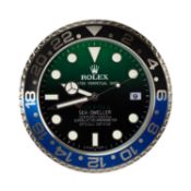 ROLEX-STYLE WALL CLOCK, modelled as a Deepsea Sea-Dweller watch dial, electric movement, 34cms (
