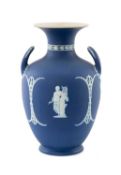 WEDGWOOD BLUE JASPER CLASSICAL VASE, the sides sprigged with female figures allegorical of the arts,