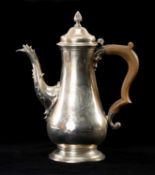 GEORGE III SILVER ARMORIAL COFFEE POT, James Baker or John Broughton, London 1764, twisted bud