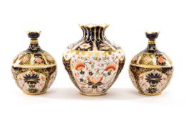 THREE ROYAL CROWN DERBY IMARI MINIATURE VASES comprising, pair of 1128 Old Imari pattern vases,