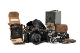 FIVE CAMERAS, including small Ensignette bellows camera, Eljy Lumière, green box Brownie, 35mm Canon