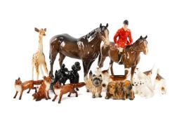 ASSORTED BESWICK ANIMALS, including Huntsman on pony, baby giraffe, three foxes, four fox hounds,