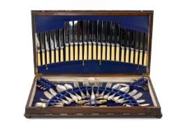 STAINED OAK CANTEEN EPNS FLATWARE, Hanoverian pattern, with celluloid knife handles, near complete