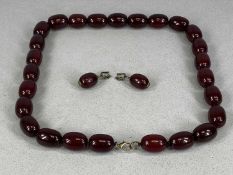 STRING OF CHERRY COLOURED 