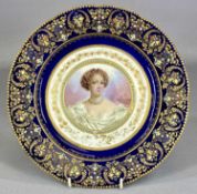 19TH CENTURY SÈVRES PORCELAIN CIRCULAR PLATE, cobalt blue border, heavily gilded and enamel