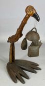 POSSIBLY HENRY HOWELL & CO. FOR ALFRED DUNHILL root wood and bakelite bird, with chimes hanging from