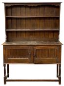 SMALL OAK DRESSER, circa 1900, two shelf rack, open bottom base with two cupboard doors, 182 (h) x