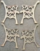 TWO PAIRS OF CAST IRON BENCH ENDS, scroll design, painted grey, 77cms (h) Provenance: private