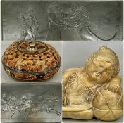 TWO REPRODUCTION BLACK COMPOSITE RECTANGULAR PANELS, decorated in relief with Assyrian figures, 38 x