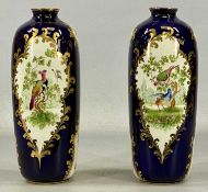 GEORGE JONES & SONS LTD. PAIR OF PORCELAIN VASES c. 1910, cobalt blue with gilded highlights, panels