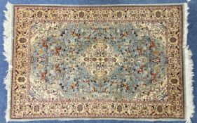 GOOD PERSIAN WOOL / SILK RUG, centre field with huntsmen and animals, floral border, 180 x 120cms