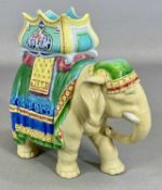 ROYAL WORCESTER PORCELAIN VASE, modelled as a caparisoned elephant bearing a howdah, well