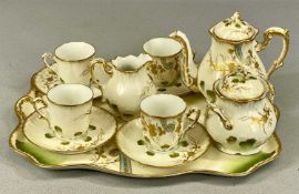 LIMOGES PORCELAIN CABARET SET, late 18th/early 19th century, cream ground with green flowers and