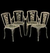 SET OF FOUR PAINTED METAL GARDEN CHAIRS, with rose pattern backs (2 +2) Provenance: private