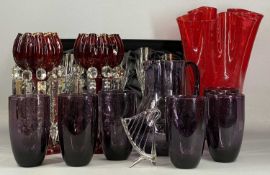 RUBY RED GLASS LUSTRE VASES, 19cms (h), together with a box set of six Thomas Webb champagne flutes,
