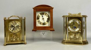 TWO BRASS-EFFECT ANNIVERSARY CLOCKS, and a wooden clock by Seiko (3) Provenance: private