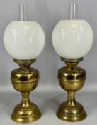 PAIR OF BRASS EFFECT OIL LAMPS with plain white circular shades Provenance: deceased estate Conwy