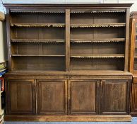 MASSIVE LATE 19TH CENTURY OAK LIBRARY BOOKCASE, upper section having adjustable shelves with