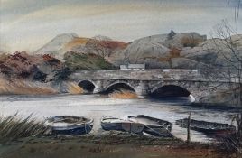 ROB PIERCY (b. 1946) watercolour - river scene with moored boats, bridge, and mountains to the