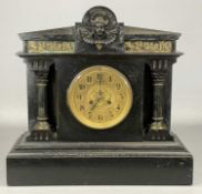 FRENCH BLACK SLATE MANTEL CLOCK with decorated frieze, gilded dial flanked by Corinthian columns, 40