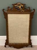 GEORGIAN STYLE WALNUT FRET FRAMED WALL MIRROR, surmounted with a gilded phoenix, 70 (h) x 40cms (