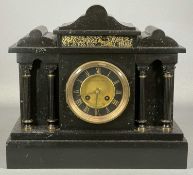 FRENCH BLACK SLATE MANTEL CLOCK with brass frieze, circular dial flanked by Corinthian columns,