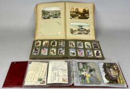 ANTIQUE / VINTAGE POSTCARDS contained in two albums, including some local, with an album of