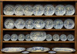 19TH CENTURY BLUE & WHITE WILLOW PATTERN TABLEWARE to the Welsh dresser Provenance: private