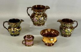 19TH CENTURY COPPER LUSTRE WARE, three graduated jugs with floral painted decoration, largest
