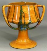 CLARICE CLIFF 'DELECIA' THREE-HANDLED PEDESTAL BOWL, 23cms (h) Provenance: deceased estate