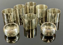SET OF SIX EDWARD VII SILVER NAPKIN RINGS, numbered 1-6 and monogrammed 'W', Barker Brothers,