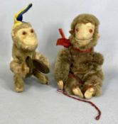 VINTAGE CLOCKWORK MOHAIR MONKEY PLAYING CYMBALS, with blue and white hat, 20cms (h); with another